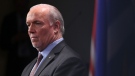 John Horgan has recalled the legislature for a brief session and throne speech Dec. 7 and plans to deliver $1,000 in pandemic relief promised to voters during the election campaign. (THE CANADIAN PRESS)