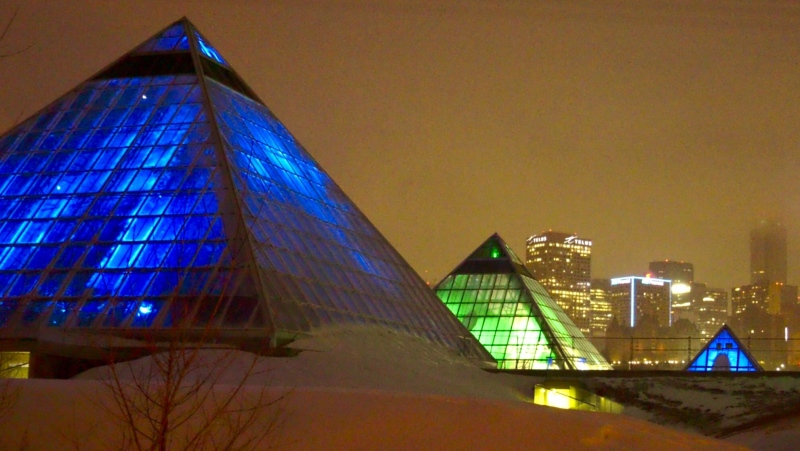 The Muttart Conservatory lit up in green and blue in honour of healthcare workers, March 23.