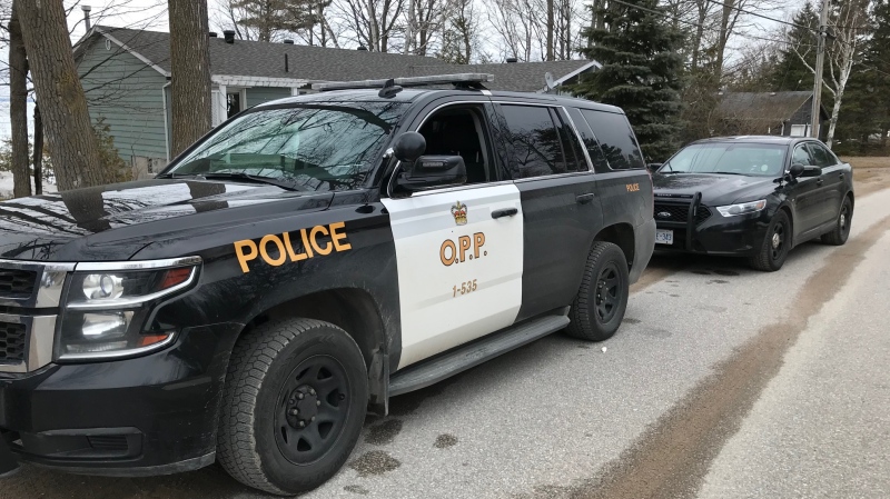 Ontario Provincial Police investigate an altercation in Midland that resulted in 6 arrests and one man in hospital on Tues., March 24, 2020. (Rob Cooper/CTV News)