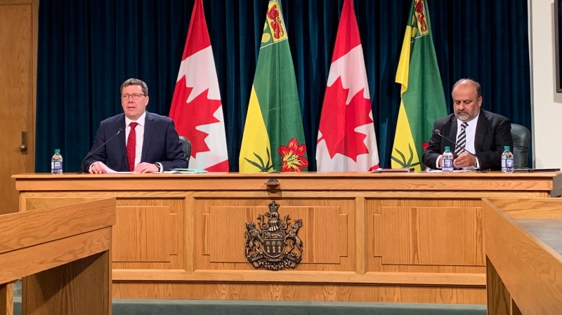 Premier Scott Moe and Chief Medical Health Officer Dr. Saqib Shahab speak at a press conference on March 25, 2020 (Marc Smith / CTV News Regina)