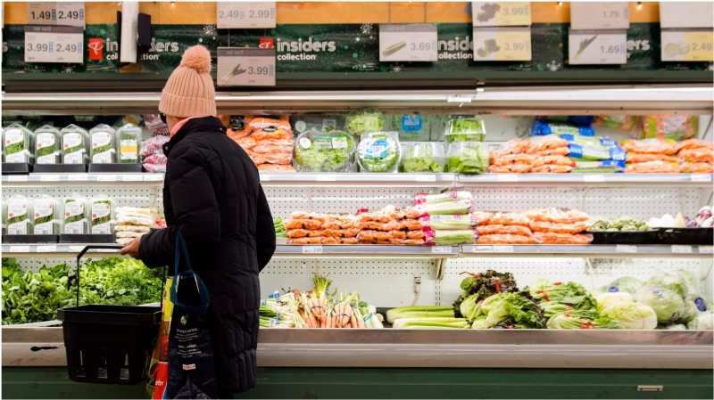 A women overlooks produce in a grocery store in Toronto on Friday, Nov. 30, 2018. THE CANADIAN PRESS/Nathan Denette