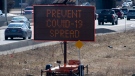 Cars drive along the highway as a sign reminds drivers to stay vigilant about the COVID-19 virus in Ottawa, Friday, March 27, 2020. THE CANADIAN PRESS/Adrian Wyld