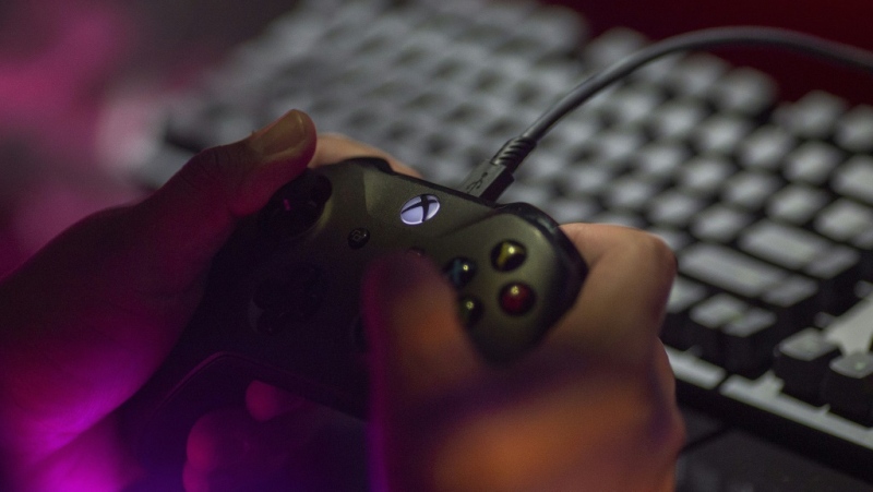 In this file photo a gaming fan plays during E3 2019 at the Los Angeles Convention Center on June 12, 2019 in Los Angeles, California.