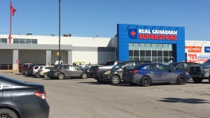 A line formed outside the Polo Park location of the Real Canadian Superstore as it limited the number of customers allowed to enter. (Source: CTV News/Zach Kitchen)