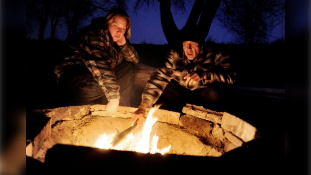 couple at a fire pit