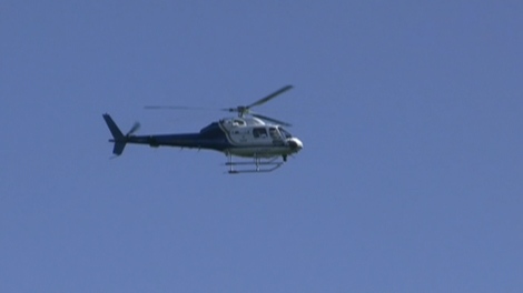 A helicopter searches Earl Bales Park in North York for missing teen Mariam Makhniashvili, Friday, Sept. 26, 2009.   
