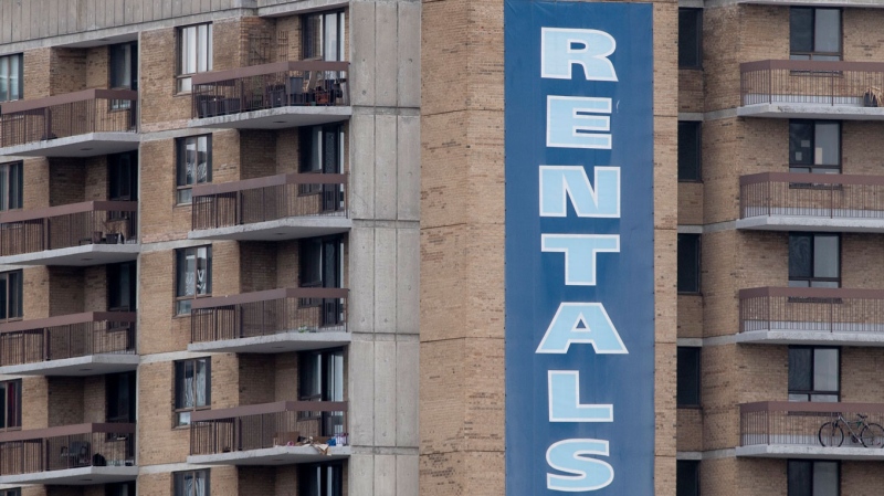 A rental sign hangs on the side of an apartment building in Ontario on Tuesday March 31, 2020. THE CANADIAN PRESS/Adrian Wyld