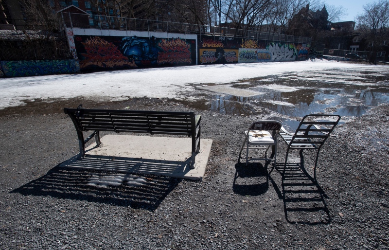 Empty benches and chairs are part of a dog park Tuesday March 31, 2020 in Ottawa. THE CANADIAN PRESS/Adrian Wyld