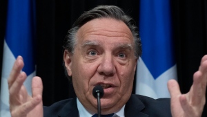Quebec Premier Francois Legault responds to reporters during a news conference on the COVID-19 pandemic, Thursday, April 2, 2020 at the legislature in Quebec City. THE CANADIAN PRESS/Jacques Boissinot