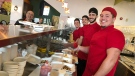 Staff at Caffé Demetré make crepes for long-term care home workers on April 3, 2020. (Beth Macdonell/CTV News Toronto)