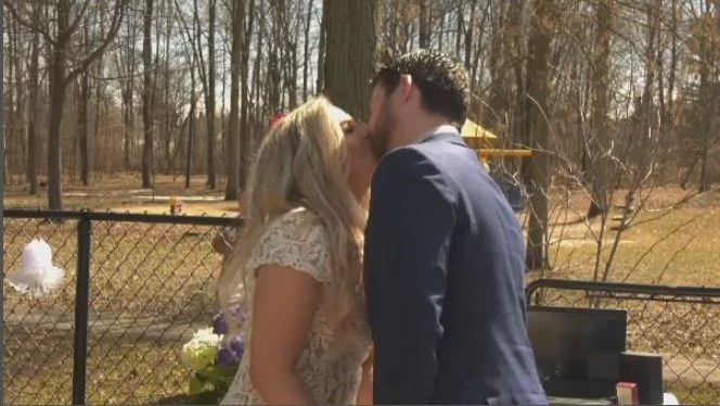Kyle Simourd and Krystal Pimcombe got married in their backyard on Saturday with guests watching on Facebook.