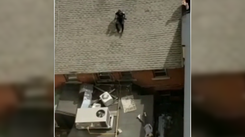 An Ottawa Police officer scaled a building to come to the aid of an unconscious woman over the weekend. (Photo courtesy: Twitter/OttawaPolice)
