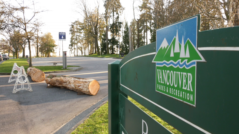A log blocks the entrance to a parking lot in Vancouver's Stanley Park on Monday, April 6, 2020. 