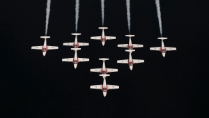 The Canadian Forces Snowbirds fly in Silver Dart formation over the Strait of Georgia while training at 19 Wing Comox. (Department of National Defence/Sgt Robert Bottrill)
