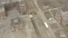 A screenshot of drone footage that shows a mass burial at New York's Hart Island where inmates have been digging mass graves and burying bodies amid a coronavirus outbreak. (Credit: The Hart Island Project via Storyful)