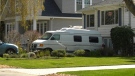 A recreational vehicle (RV) is seen parked in an Oak Bay driveway: April 8, 2020 (CTV News)