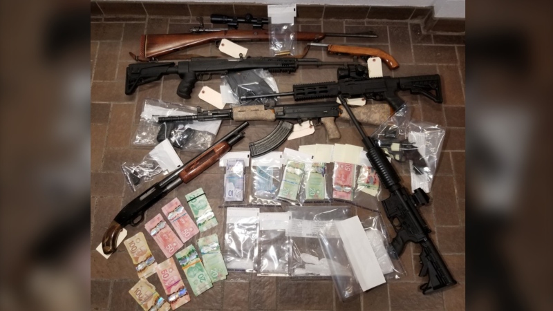 Police executed a search warrant on the same home on April 2, and seized firearms and what’s believed to be crystal methamphetamine, according to police. (Photo courtesy: Codiac Regional RCMP)