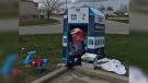 An overflowing charitable donation bin on Bessemer Road in London, Ont. is seen Thursday, April 9, 2020. (Sean Irvine / CTV London)