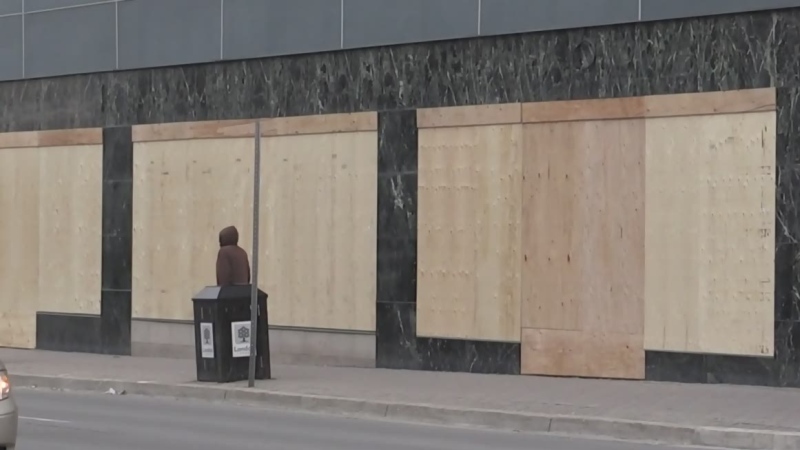 Businesses are boarded up in downtown London, Ont. to combat break-ins and vandalism, Monday, April 13, 2020. (Daryl Newcombe / CTV London) 