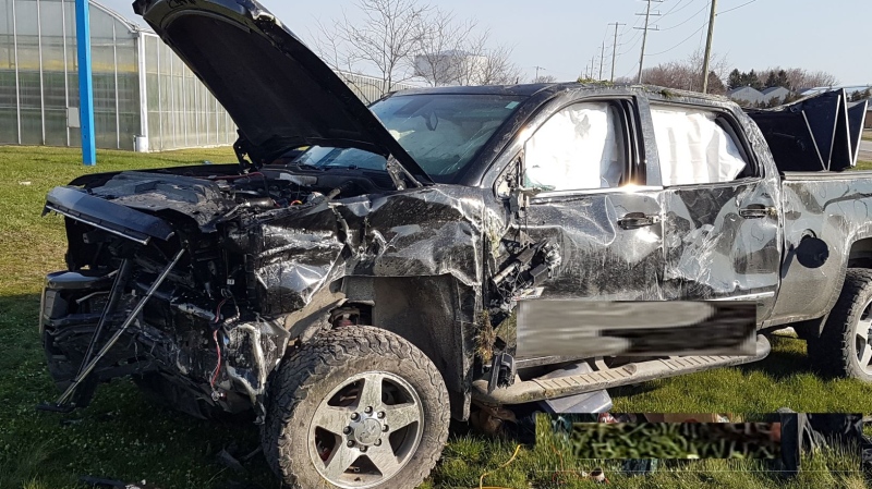 A black truck was involved in the crash in Leamington, Ont., on Wednesday, April 15, 2020. (Courtesy OPP)