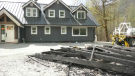 Alicia Myton and Todd Mumford's carport was destroyed by a wildfire, but their home was saved. (CTV)