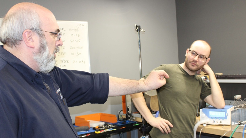 Larry Koscielski, VP at CentreLine, with James Durocher, faculty in BioMedical Engineering Technologies in Windsor, Ont. (Courtesy St. Clair College)