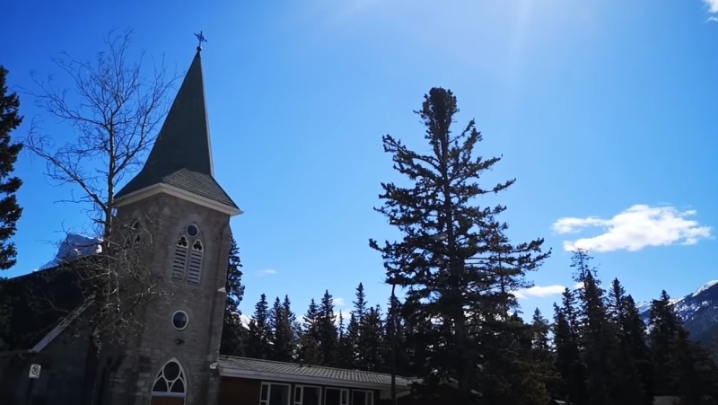 St. George-in-the-Pines Anglican Church is seen in Banff, Alta. in this image taken from YouTube.