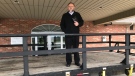 Pastor Henry Hildebrandt of the Church of God in Alymer, Ont. stands on a platform placed in front of his church utilized to deliver his sermon on Friday, April 24, 2019. (Sean Irvine / CTV London)