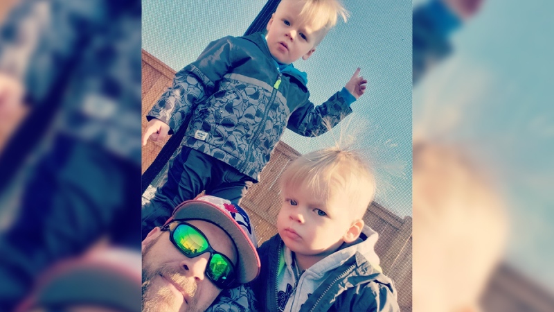 Danny King and his twin boys are seen in this family photo.