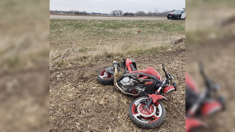 OPP work at the scene of a crash involving a motorcycle and a deer in Perth County, Ont. on Friday, April 24, 2020. (@OPP_WR / Twitter)