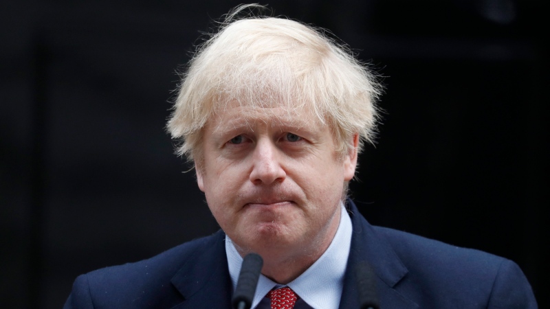 British Prime Minister Boris Johnson finishes making a statement on his first day back at work in Downing Street, London, after recovering from a bout with the coronavirus that put him in intensive care, Monday, April 27, 2020. (AP Photo/Frank Augstein)