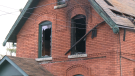 Burned out windows of a home in Ottawa's Britannia neighbourhood after a fatal fire on Monday, April 27, 2020. Three people had to be rescued from inside the home, and they later died in hospital. 