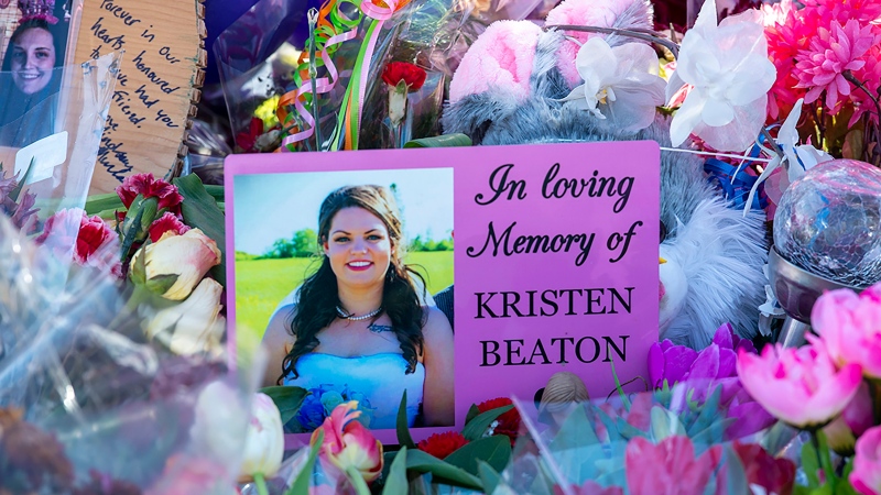 A photo of Kristen Beaton is displayed at a memorial in Debert, N.S. on Sunday, April 26, 2020. The VON care worker was shot and killed when she stopped along the road. (THE CANADIAN PRESS/Andrew Vaughan)