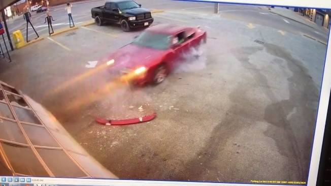 MacDonald’s Automotive posted video of the car crashing through the door online on Tuesday, May 5, 2020. (MacDonald’s Automotive / Facebook)