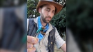 American wildlife expert Coyote Peterson is pictured in October 2018 with a Japanese giant hornet, a subspecies of the Asian giant hornet. (Courtesy Brave Wilderness)