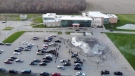 This image taken from video shows cars doing donuts and burnouts in the parking lot of the Forest City Community Church in London, Ont. (Source: Nick Taylor)
