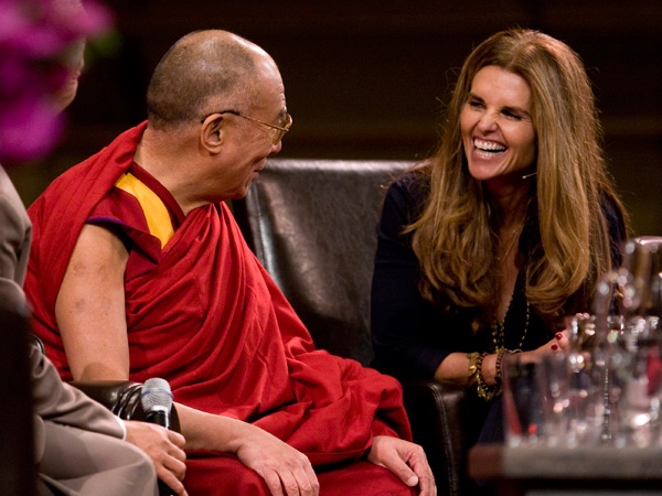 His Holiness the Dalai Lama, left, takes part in a conversation with Maria Shriver in Vancouver Tuesday, Sept. 29, 2009. THE CANADIAN PRESS/Jonathan Hayward