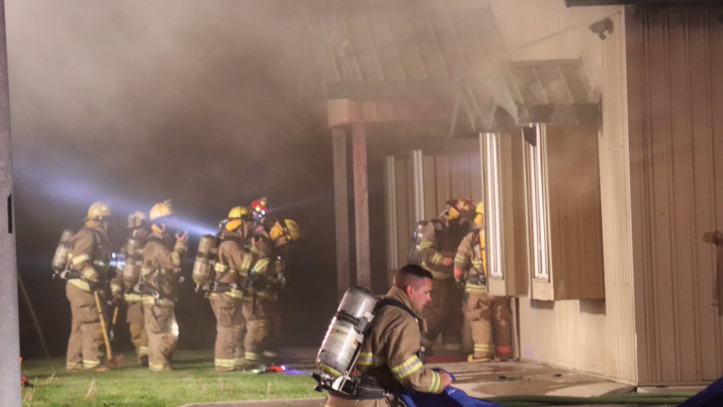 Lakeshore Fire crews battle midnight fire in 1300 block of County Road 22 in Lakeshore, Ont., on Wednesday, May 13, 2020. (Courtesy OnLocation/Twitter) 