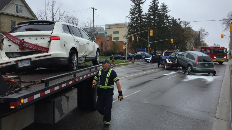 Crews work to remove vehicles involved in a crash on Richmond Street near Cheapside Street on Friday, May 15, 2020. (Bryan Bicknell / CTV London)