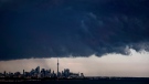 Storm clouds roll over the skyline in Toronto on Thursday, July 26, 2018. THE CANADIAN PRESS/Mark Blinch