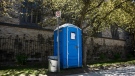A porta-pottie beside Knox Presbyterian Church in downtown Ottawa, placed to allow people including those who are homeless or precariously housed to access a washroom, is seen on Wednesday, May 20, 2020 during the COVID-19 pandemic. (THE CANADIAN PRESS/Justin Tang)
