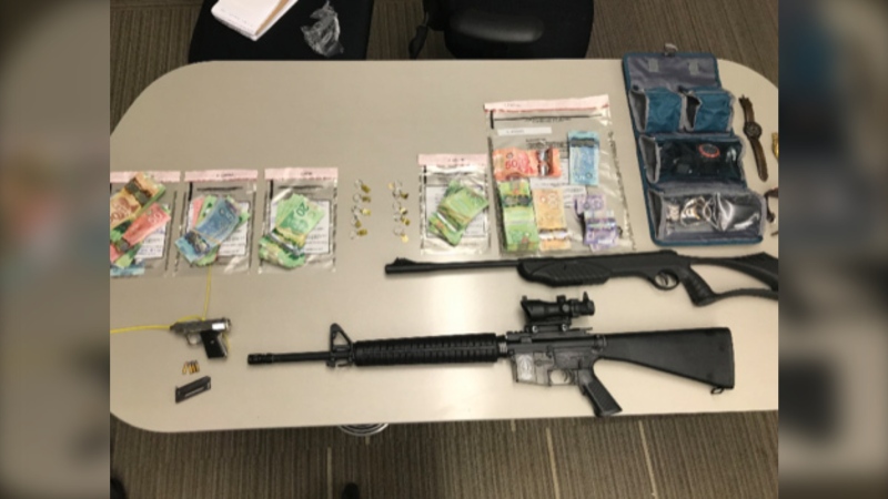 Four people are facing more than 300 charges after police seized drugs, cash, stolen property and firearms in April and May. May 21, 2020.  (Edmonton Police Service)