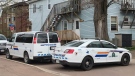 Police are seen at the scene of a fatal shooting in Moncton, N.B., on May 22, 2020. (Jonathan MacInnis/CTV Atlantic)