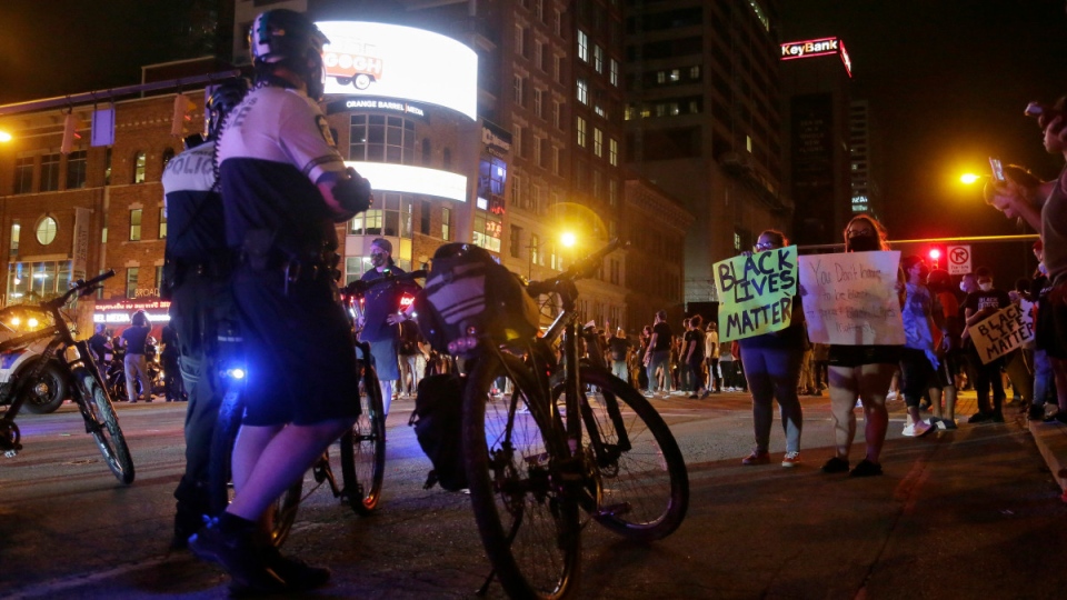 Police watch protesters in downtown Columbus, Ohio