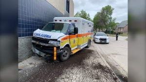 One person was taken into custody after an ambulance was stolen Friday morning. The ambulance crashed into the Portuguese Cultural Centre (CTV News Photo Jamie Dowsett)