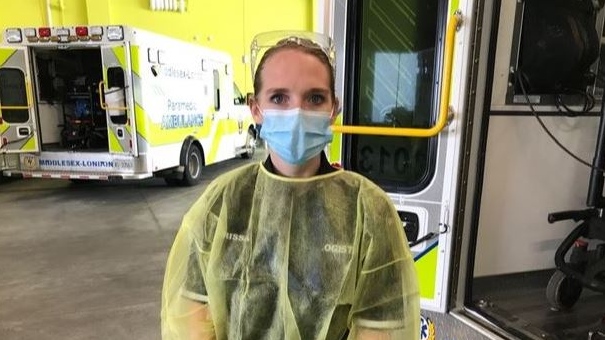 Middlesex-London Paramedic Service Logistics Team Member Larissa Foote wear full PPE gear as she prepares to sanitize an ambulance (Sean Irvine CTV)
