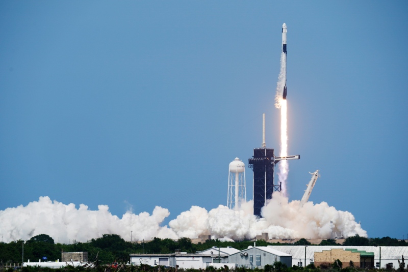 A SpaceX Falcon 9, with NASA astronauts Doug Hurley and Bob Behnken in the Dragon crew capsule, lifts off from Pad 39-A at the Kennedy Space Center in Cape Canaveral, Fla., Saturday, May 30, 2020. For the first time in nearly a decade, astronauts blasted towards orbit aboard an American rocket from American soil, a first for a private company. (AP Photo/David J. Philip)
