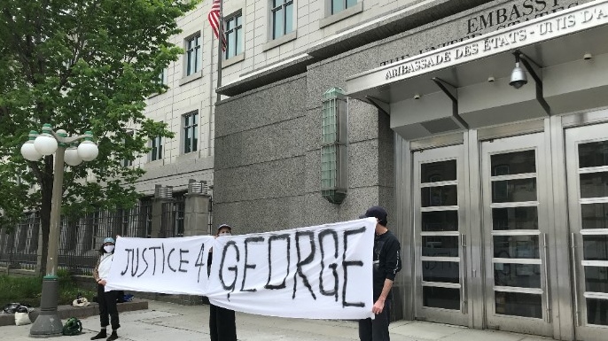 A group held a "Justice 4 George" rally outside the U.S. Embassy in Ottawa following the death of George Floyd in Minnesota. (Leah Larocque/CTV News Ottawa)