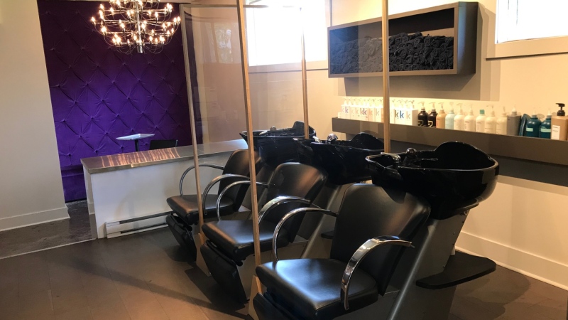 Protective barriers are placed between hair washing stations at Salon TOK in Gatineau. The salon is one of many that will be allowed to open in Quebec June 1, 2020. (Leah Larocque / CTV News Ottawa)
