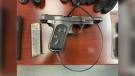 A gun Ontario Provincial Police say was seized during a traffic stop on Highway 401 near Kingston, Ont. early Tues. June 2, 2020. (OPP handout)